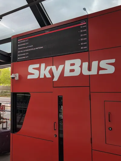 Live departure board at the Terminal 4 SkyBus stop — city services plus suburban routes leave from here