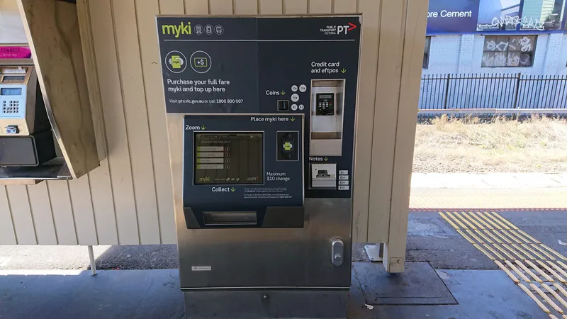Ticket machine on a station platform — buy a full-fare myki or top one up, with coins, notes, credit card or EFTPOS