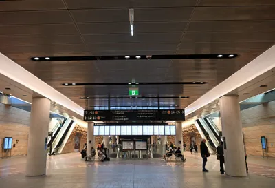 Underground concourse at Central. The T roundel means Sydney Trains; 1-11, 12-13 and 14-25 are platform numbers.