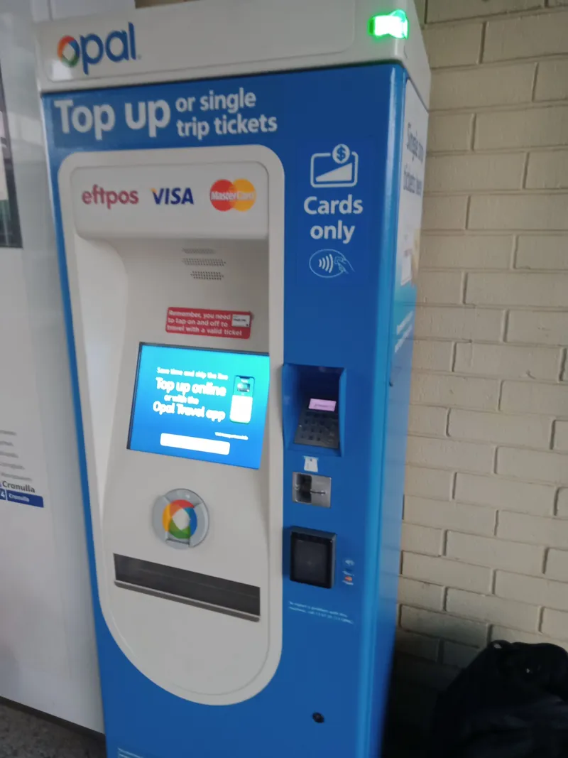 An Opal machine at a station: top-ups and paper single tickets. This one is card-only — no cash.