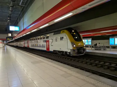 A double-deck train at the airport station. Services for the North, Central and South stations also leave from these underground platforms.