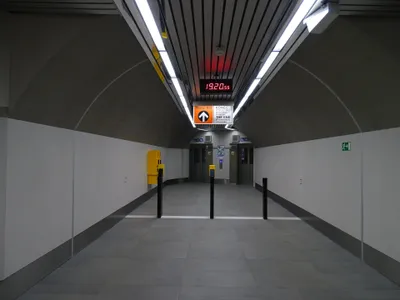 "The end of compulsory ticket area" - keep your ticket in hand until you are past this sign
