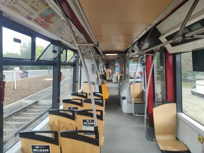 The yellow validator on a pole inside the tram - a paper ticket goes in once, straight after you board