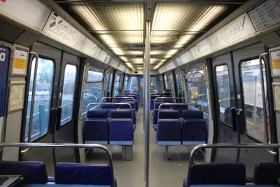 Inside a train — on older stock you open the doors yourself with a button or latch