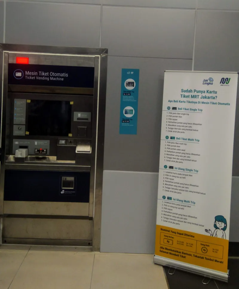 Station ticket vending machine — buy or top up a card here or at the counter