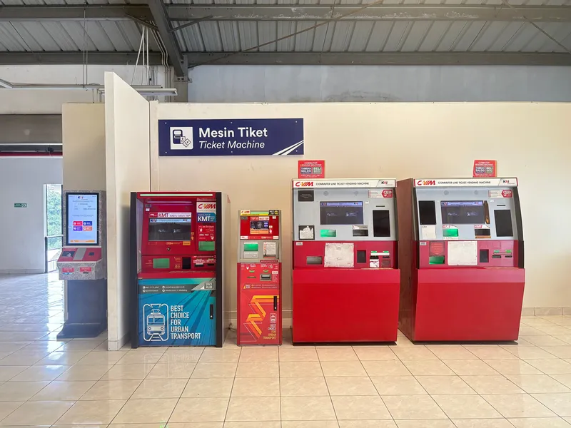 Ticket machines at a KRL station: buy a KMT (Kartu Multi Trip) card here, or top one up