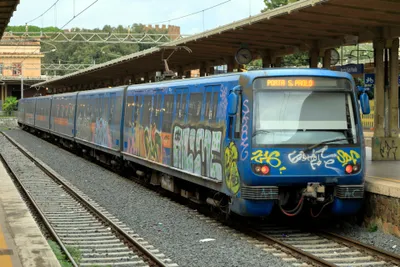 A blue Metromare train at Porta San Paolo, the line's Rome terminus