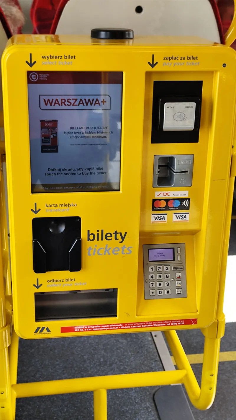 The on-board ticket machine: a card reader and a chip slot on the right, and no coin or banknote slot anywhere on it.