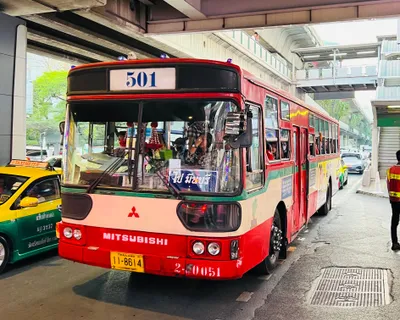 A BMTA city bus — the route number sits on a board above the windscreen