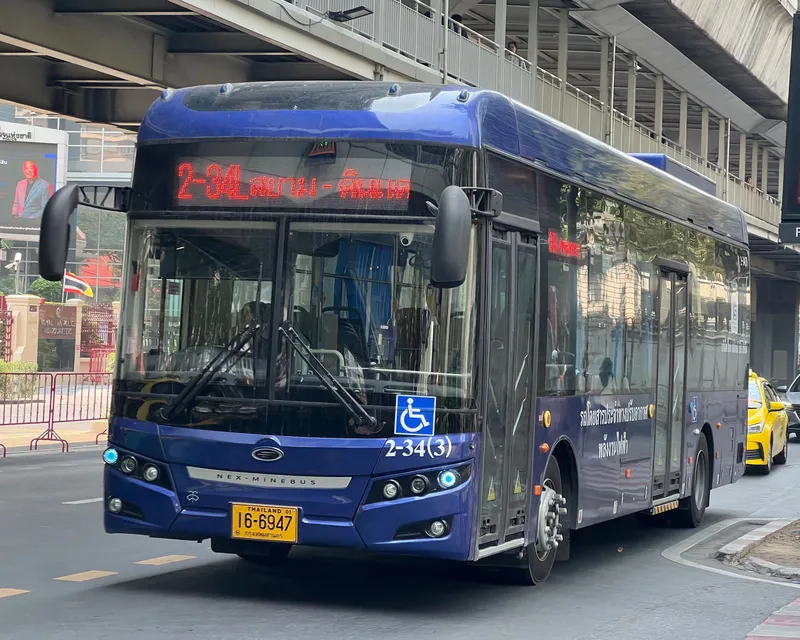 A Thai Smile Bus electric bus — dark blue is the livery to look for