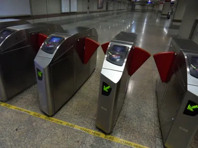 MRT subway fare gates — a different operator from the BTS, with separate gatelines