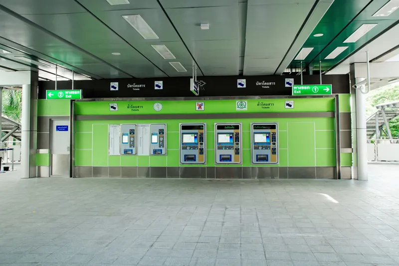 Ticket machines at a BTS Skytrain station — buy single-journey tickets here (older machines take coins only)