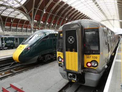 The Heathrow Express at Paddington (right), alongside an intercity GWR train