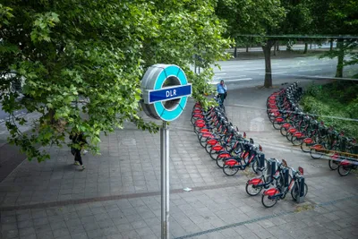A docking station beside a DLR station entrance