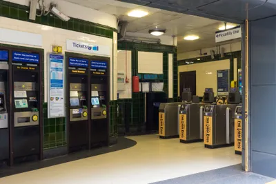 Station ticket machines — paper singles cost more, so skip the queue if you can tap
