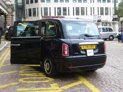 You get in through the rear door — at the rank outside Charing Cross station