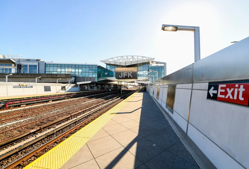 The A-train platform at Howard Beach–JFK; go up into the glass mezzanine spanning the tracks, then cross to the AirTrain