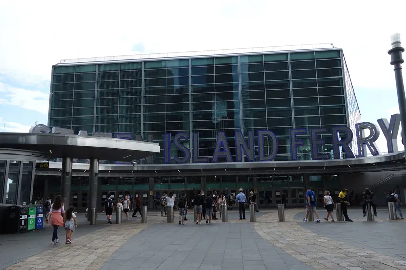 Whitehall Terminal on the Manhattan side, with STATEN ISLAND FERRY spelled across the front