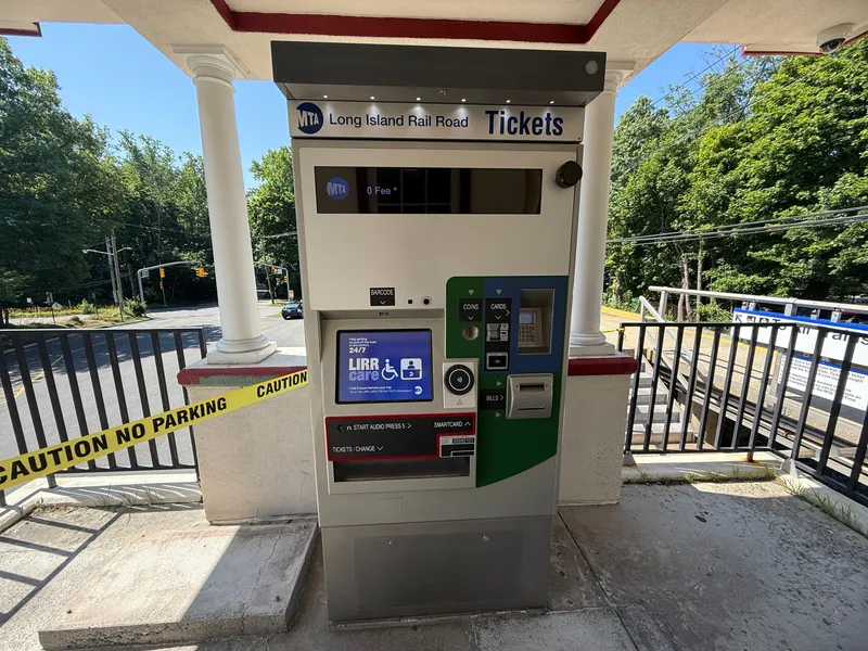 An LIRR ticket vending machine — coins, bills and cards; buy your ticket before boarding