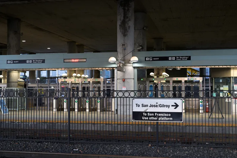 Millbrae station — the BART fare gates seen from the Caltrain platform