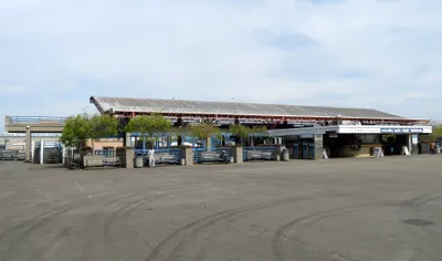 The Golden Gate Ferry terminal on the San Francisco side — look for the blue 'GOLDEN GATE FERRY TERMINAL' sign under the red steel canopy