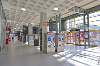 Concourse of San Francisco (4th & King) station — the red 'tickets' machines handle both paper tickets and Clipper